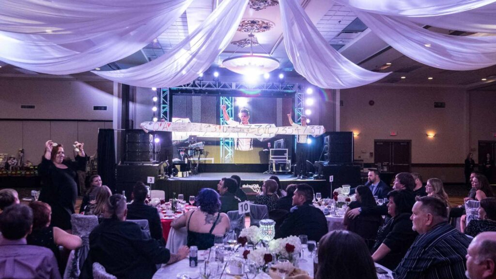 Chris Funk Performing At A Corporate Event